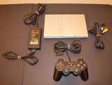 image for PS2 Slim with controller, power, and a/v cords (secondhand)